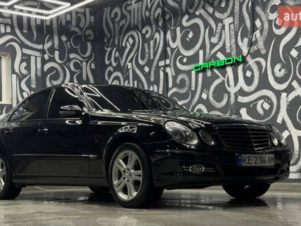 Черный Мерседес Е-Класс, объемом двигателя 5.46 л и пробегом 356 тыс. км за 28000 $, фото 1 на Automoto.ua