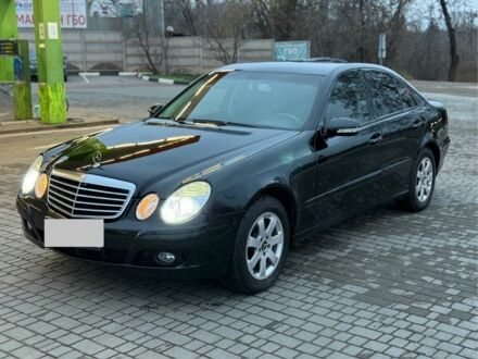 Черный Мерседес Е-Класс, объемом двигателя 2 л и пробегом 245 тыс. км за 7500 $, фото 1 на Automoto.ua