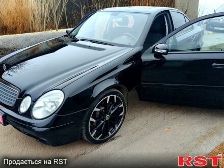 Черный Мерседес Е-Класс, объемом двигателя 1.8 л и пробегом 270 тыс. км за 8400 $, фото 1 на Automoto.ua