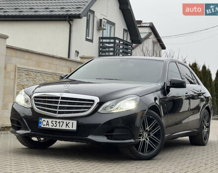 Чорний Мерседес Е-Клас, об'ємом двигуна 2 л та пробігом 329 тис. км за 13600 $, фото 1 на Automoto.ua