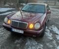 Червоний Мерседес Е-Клас, об'ємом двигуна 2 л та пробігом 300 тис. км за 2999 $, фото 1 на Automoto.ua