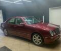 Красный Мерседес Е-Класс, объемом двигателя 2.2 л и пробегом 156 тыс. км за 6999 $, фото 1 на Automoto.ua