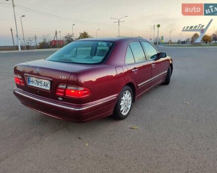 Красный Мерседес Е-Класс, объемом двигателя 2.2 л и пробегом 156 тыс. км за 6999 $, фото 7 на Automoto.ua