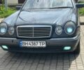 Серый Мерседес Е-Класс, объемом двигателя 2.3 л и пробегом 306 тыс. км за 4299 $, фото 1 на Automoto.ua