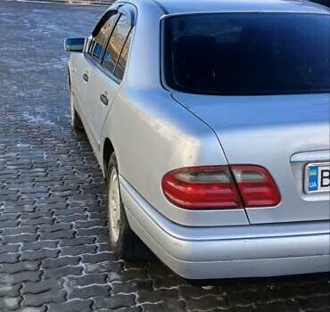 Серый Мерседес Е-Класс, объемом двигателя 2 л и пробегом 344 тыс. км за 3300 $, фото 82 на Automoto.ua