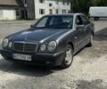 Сірий Мерседес Е-Клас, об'ємом двигуна 2 л та пробігом 1000 тис. км за 1999 $, фото 1 на Automoto.ua