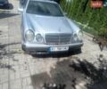 Сірий Мерседес Е-Клас, об'ємом двигуна 2 л та пробігом 225 тис. км за 2400 $, фото 1 на Automoto.ua