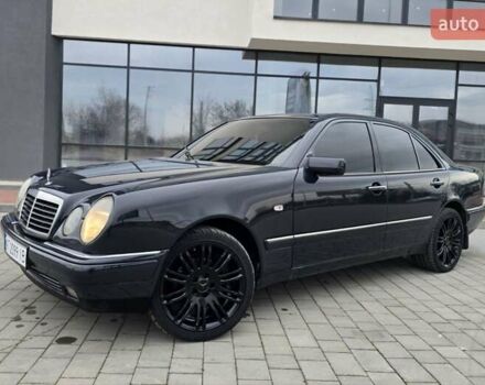 Сірий Мерседес Е-Клас, об'ємом двигуна 2 л та пробігом 245 тис. км за 3750 $, фото 59 на Automoto.ua