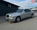Сірий Мерседес Е-Клас, об'ємом двигуна 2 л та пробігом 355 тис. км за 4600 $, фото 1 на Automoto.ua