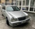 Сірий Мерседес Е-Клас, об'ємом двигуна 2 л та пробігом 27 тис. км за 4600 $, фото 1 на Automoto.ua