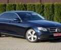Синій Мерседес Е-Клас, об'ємом двигуна 2 л та пробігом 195 тис. км за 32558 $, фото 1 на Automoto.ua