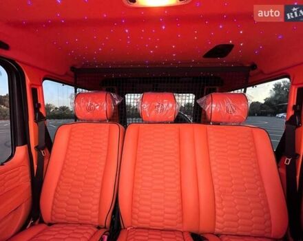 Білий Мерседес Г-Клас, об'ємом двигуна 4 л та пробігом 143 тис. км за 84999 $, фото 13 на Automoto.ua