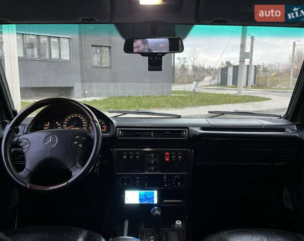 Черный Мерседес Г-Класс, объемом двигателя 5 л и пробегом 252 тыс. км за 20100 $, фото 1 на Automoto.ua