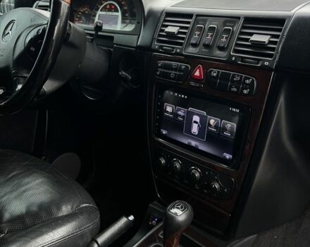 Чорний Мерседес Г-Клас, об'ємом двигуна 5 л та пробігом 258 тис. км за 21900 $, фото 2 на Automoto.ua