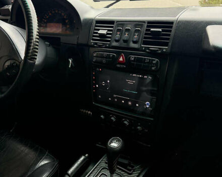 Черный Мерседес Г-Класс, объемом двигателя 4.97 л и пробегом 167 тыс. км за 31777 $, фото 12 на Automoto.ua