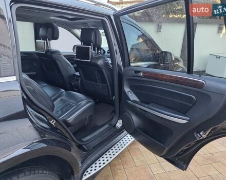 Черный Мерседес ГЛ-класс, объемом двигателя 5.5 л и пробегом 130 тыс. км за 15000 $, фото 2 на Automoto.ua