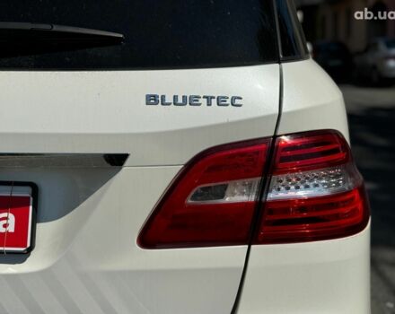 Білий Мерседес М-Клас, об'ємом двигуна 3 л та пробігом 198 тис. км за 23790 $, фото 11 на Automoto.ua