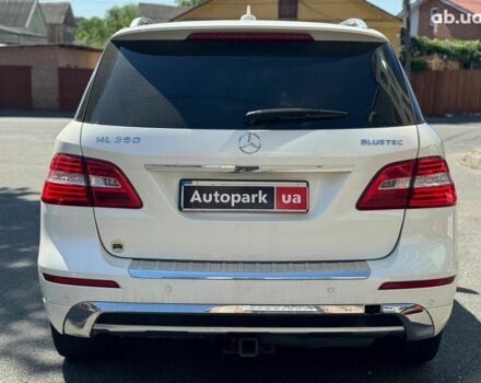 Білий Мерседес М-Клас, об'ємом двигуна 3 л та пробігом 198 тис. км за 23790 $, фото 4 на Automoto.ua