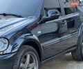 Черный Мерседес М-Класс, объемом двигателя 5.5 л и пробегом 290 тыс. км за 9000 $, фото 1 на Automoto.ua