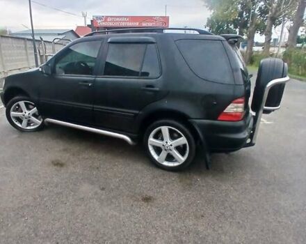 Черный Мерседес М-Класс, объемом двигателя 3.2 л и пробегом 400 тыс. км за 5800 $, фото 1 на Automoto.ua