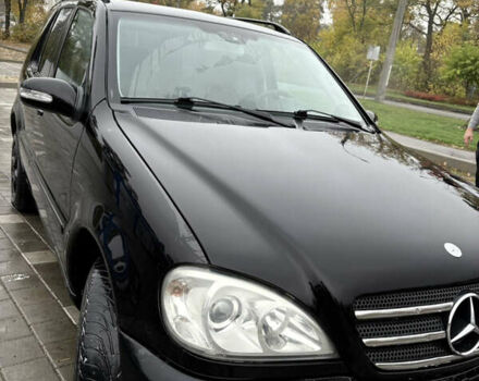 Черный Мерседес М-Класс, объемом двигателя 3.5 л и пробегом 230 тыс. км за 7500 $, фото 14 на Automoto.ua