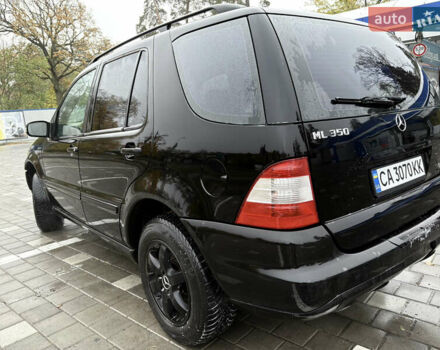 Черный Мерседес М-Класс, объемом двигателя 3.5 л и пробегом 230 тыс. км за 7500 $, фото 4 на Automoto.ua