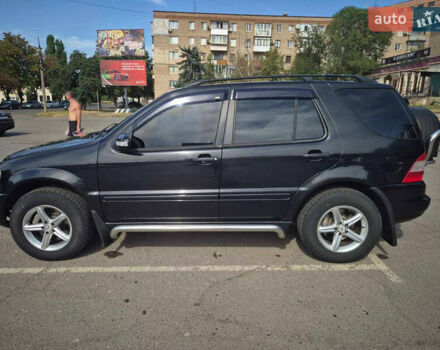 Черный Мерседес М-Класс, объемом двигателя 3.2 л и пробегом 357 тыс. км за 5000 $, фото 4 на Automoto.ua