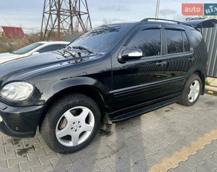 Черный Мерседес М-Класс, объемом двигателя 3.72 л и пробегом 300 тыс. км за 7700 $, фото 4 на Automoto.ua