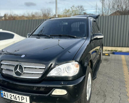 Черный Мерседес М-Класс, объемом двигателя 3.72 л и пробегом 300 тыс. км за 7700 $, фото 1 на Automoto.ua