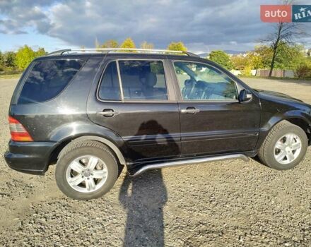 Чорний Мерседес М-Клас, об'ємом двигуна 4 л та пробігом 304 тис. км за 6900 $, фото 27 на Automoto.ua