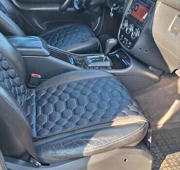 Черный Мерседес М-Класс, объемом двигателя 3.7 л и пробегом 322 тыс. км за 6000 $, фото 9 на Automoto.ua