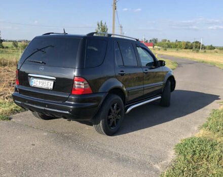 Черный Мерседес М-Класс, объемом двигателя 2.69 л и пробегом 300 тыс. км за 10000 $, фото 5 на Automoto.ua