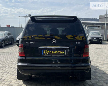 Чорний Мерседес М-Клас, об'ємом двигуна 4 л та пробігом 319 тис. км за 10700 $, фото 5 на Automoto.ua