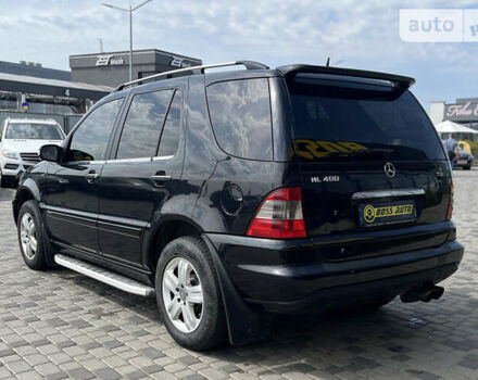 Чорний Мерседес М-Клас, об'ємом двигуна 4 л та пробігом 319 тис. км за 10700 $, фото 4 на Automoto.ua