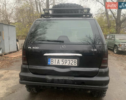 Чорний Мерседес М-Клас, об'ємом двигуна 4 л та пробігом 357 тис. км за 5100 $, фото 3 на Automoto.ua