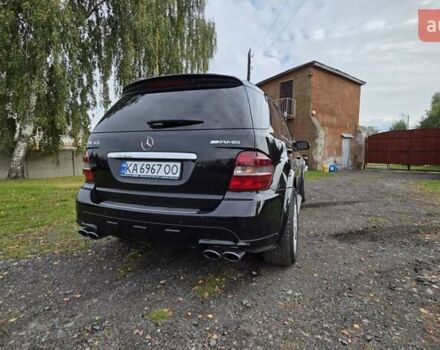 Чорний Мерседес М-Клас, об'ємом двигуна 6.2 л та пробігом 286 тис. км за 10599 $, фото 16 на Automoto.ua