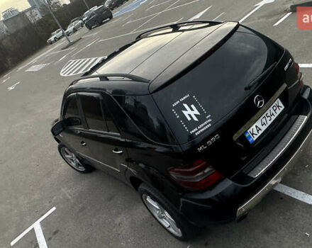 Черный Мерседес М-Класс, объемом двигателя 4.97 л и пробегом 335 тыс. км за 10500 $, фото 7 на Automoto.ua