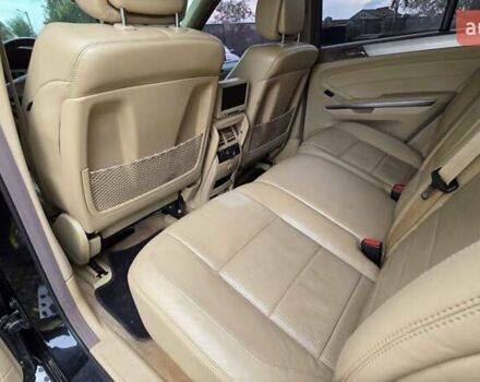 Чорний Мерседес М-Клас, об'ємом двигуна 6.2 л та пробігом 286 тис. км за 10599 $, фото 22 на Automoto.ua