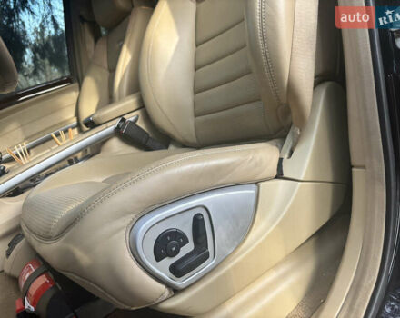 Черный Мерседес М-Класс, объемом двигателя 6.3 л и пробегом 148 тыс. км за 12500 $, фото 11 на Automoto.ua