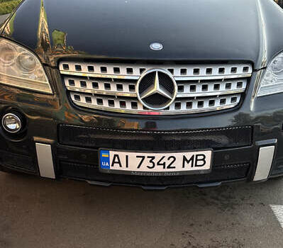 Черный Мерседес М-Класс, объемом двигателя 4.97 л и пробегом 277 тыс. км за 9500 $, фото 6 на Automoto.ua