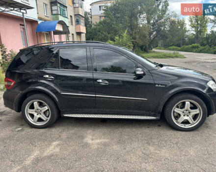 Черный Мерседес М-Класс, объемом двигателя 6.3 л и пробегом 148 тыс. км за 12500 $, фото 3 на Automoto.ua