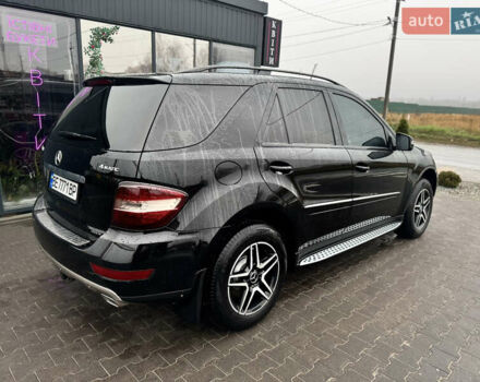 Черный Мерседес М-Класс, объемом двигателя 3.5 л и пробегом 196 тыс. км за 15000 $, фото 49 на Automoto.ua