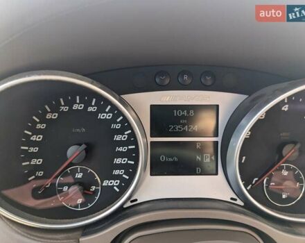Черный Мерседес М-Класс, объемом двигателя 6.2 л и пробегом 236 тыс. км за 13000 $, фото 18 на Automoto.ua