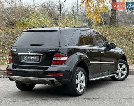 Черный Мерседес М-Класс, объемом двигателя 3.5 л и пробегом 265 тыс. км за 14300 $, фото 23 на Automoto.ua