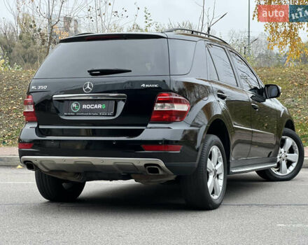 Черный Мерседес М-Класс, объемом двигателя 3.5 л и пробегом 265 тыс. км за 14300 $, фото 22 на Automoto.ua