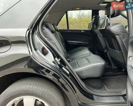 Черный Мерседес М-Класс, объемом двигателя 3.5 л и пробегом 265 тыс. км за 14300 $, фото 61 на Automoto.ua