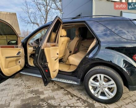 Черный Мерседес М-Класс, объемом двигателя 3.5 л и пробегом 250 тыс. км за 11000 $, фото 12 на Automoto.ua