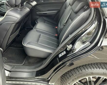 Черный Мерседес М-Класс, объемом двигателя 3.5 л и пробегом 128 тыс. км за 15200 $, фото 20 на Automoto.ua