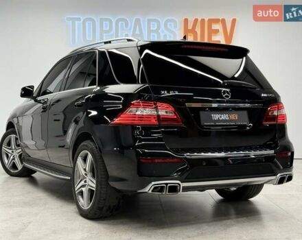 Черный Мерседес М-Класс, объемом двигателя 5.46 л и пробегом 119 тыс. км за 32990 $, фото 10 на Automoto.ua