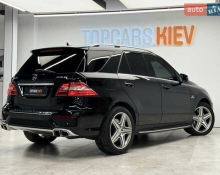 Черный Мерседес М-Класс, объемом двигателя 5.46 л и пробегом 119 тыс. км за 32990 $, фото 4 на Automoto.ua